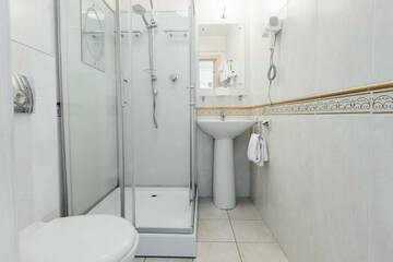 Фото номера Улучшенный двухместный номер с 1 кроватью Гостиница Купцовъ Дом г. Ярославль 6