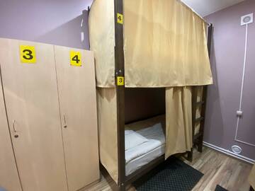 Фото номера Кровать в 12-местном общем мужском номере Отель Moonrise  г. Ярославль 2